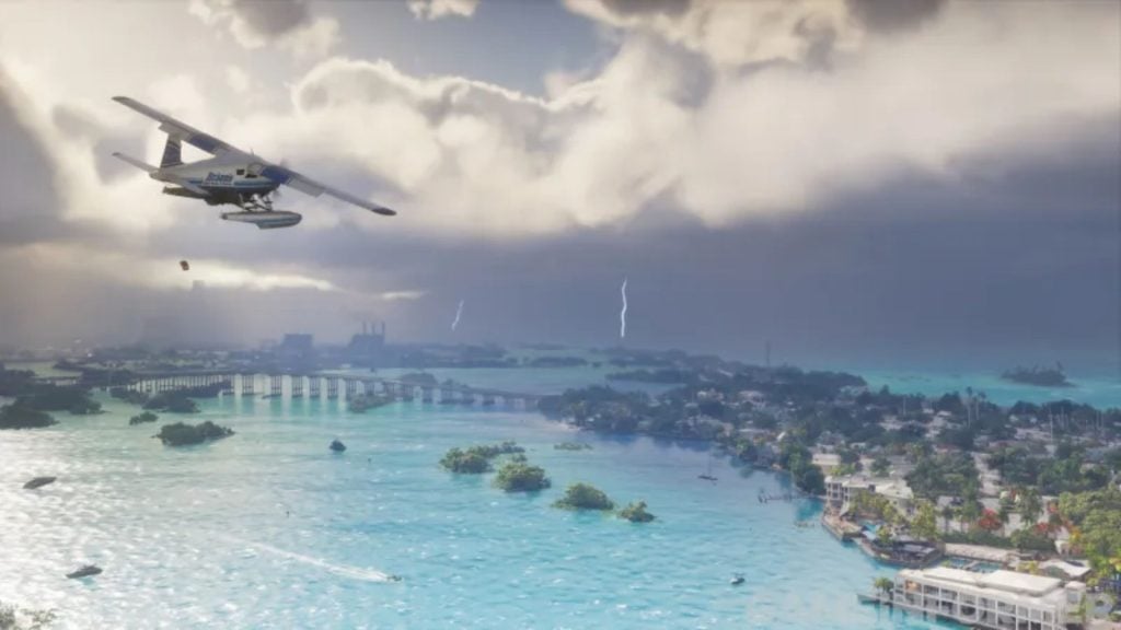 Vista de la costa. Una aeronave sobrevuela una costa de aguas claras y pequeños islotes.